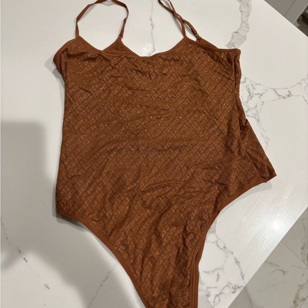 Skims shimmer body suit